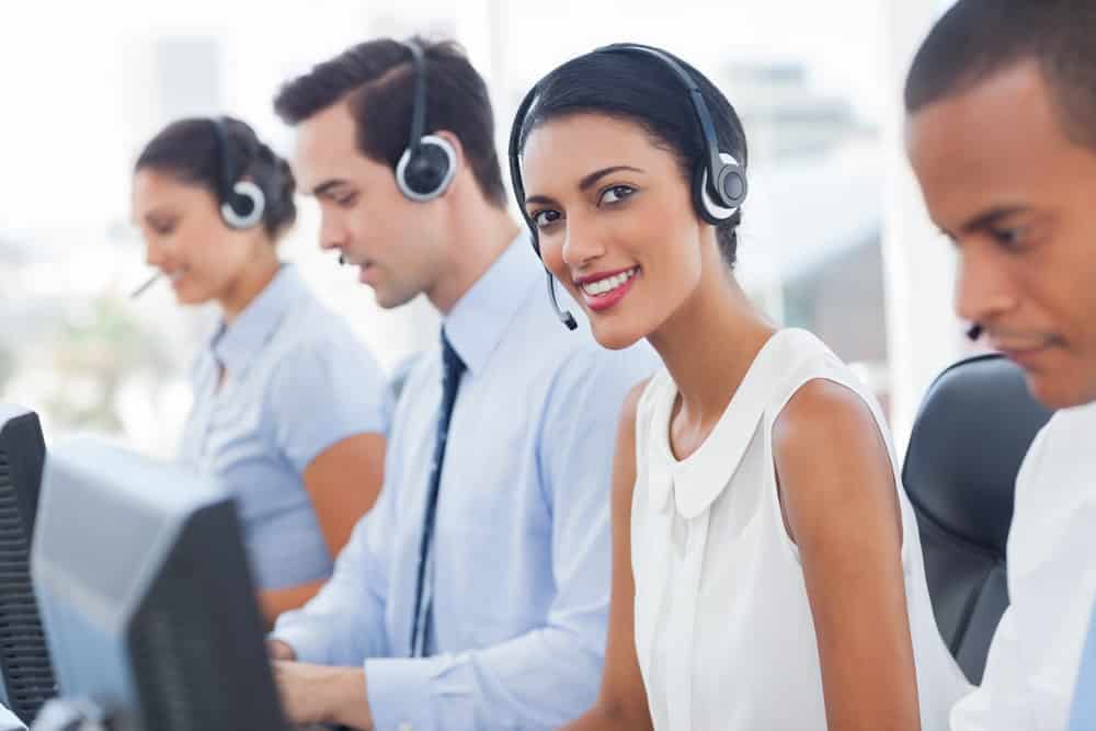 men and women at call center